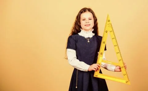 Math lesson. Education and knowledge. School student learning geometry. STEM 写真素材