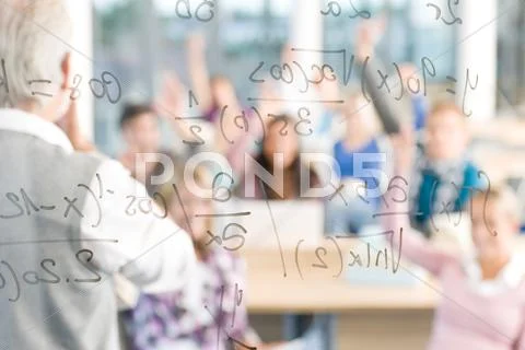 Math lesson at high school - students with professor Stock Photos