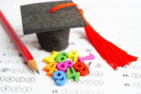 Math number with graduation gap hat on answer sheet test choice for learnin.. Stock Photos
