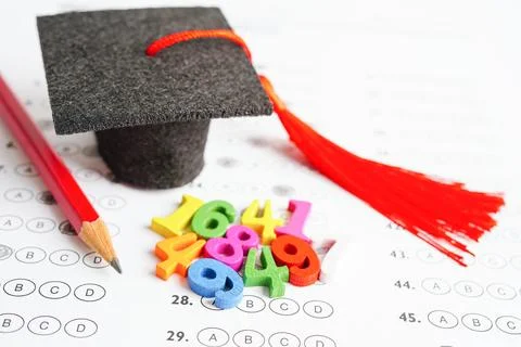 Math number with graduation gap hat on answer sheet test choice for learnin.. Stock Photos