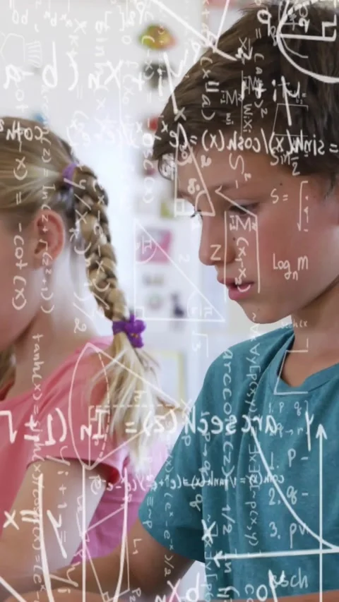 Math overlay appearing, two students shifting gazes, writing, collaborating to Stock Footage 331738871