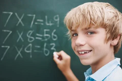 Math, student and portrait at chalkboard at school with problem solving 스톡 사진
