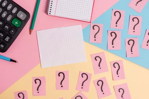 Math stuff with scribbled and crumbling papers plus writing equipment on Stock Photos