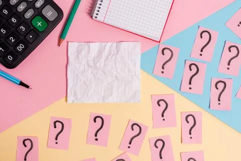 Math stuff with scribbled and crumbling papers plus writing equipment on Stock Photos