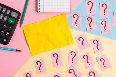 Math stuff with scribbled and crumbling papers plus writing equipment on Stock Photos