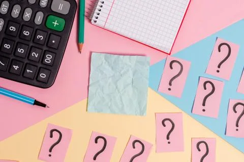 Math stuff with scribbled and crumbling papers plus writing equipment on Stock Photos