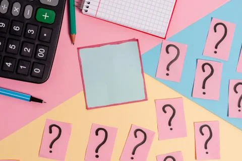 Math stuff with scribbled and crumbling papers plus writing equipment on Stock Photos