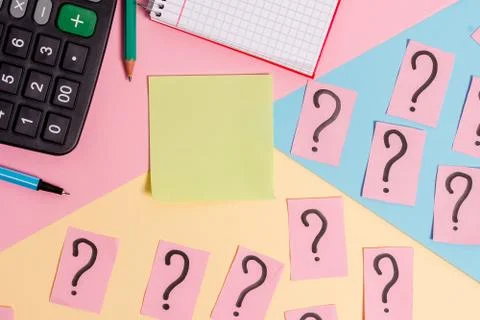 Math stuff with scribbled and crumbling papers plus writing equipment on Stock Photos