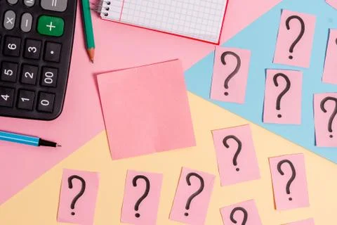 Math stuff with scribbled and crumbling papers plus writing equipment on Stock Photos