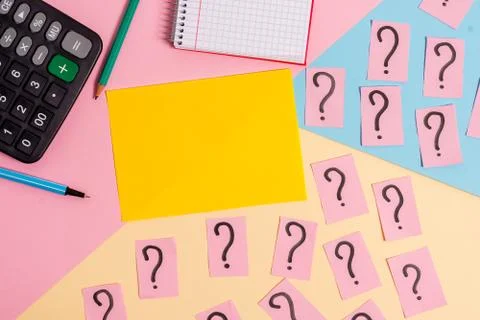 Math stuff with scribbled and crumbling papers plus writing equipment on Stock Photos