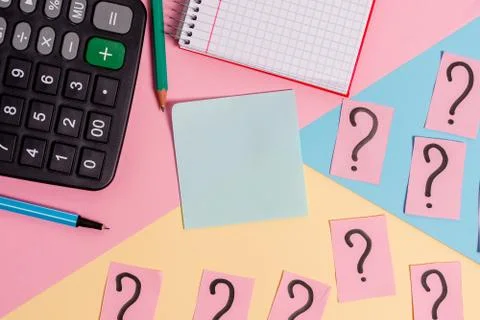 Math stuff with scribbled and crumbling papers plus writing equipment on Stock Photos