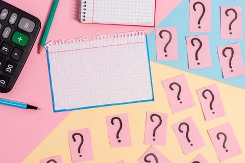 Math stuff with scribbled and crumbling papers plus writing equipment on Stock Photos