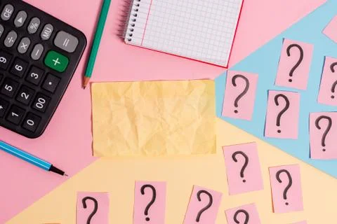 Math stuff with scribbled and crumbling papers plus writing equipment on Stock Photos