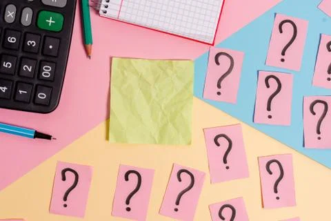 Math stuff with scribbled and crumbling papers plus writing equipment on Stock Photos