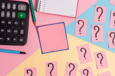 Math stuff with scribbled and crumbling papers plus writing equipment on Stock Photos