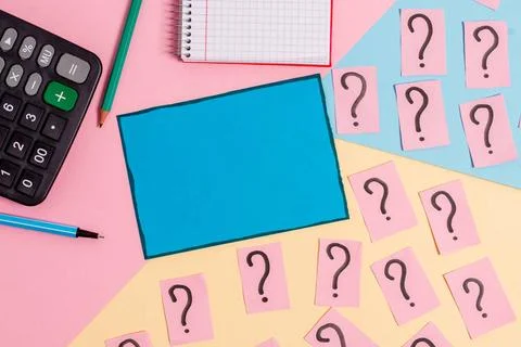 Math stuff with scribbled and crumbling papers plus writing equipment on c... Stock Photos