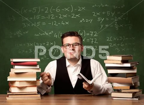 Math teacher at desk Stock Photos
