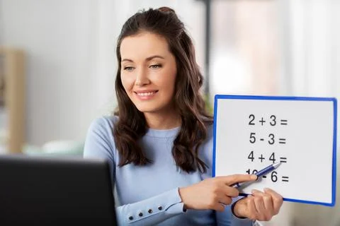 Math teacher having online class at home Stock Photos