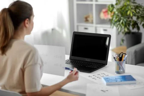 Math teacher having online class at home Stock Photos
