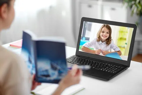 Math teacher having online class at home Stock Photos