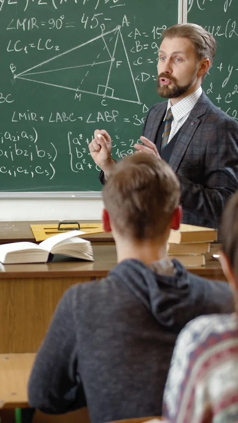 Math Teacher Instructs Class Video stock 322653113