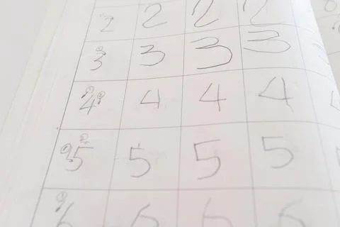 Math Worksheet with Student Handwritten Numbers Stock Photos