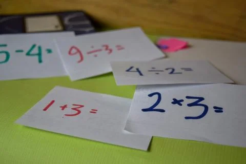 Math write on a sticky note isolated on Office Desk. Education concept Stock Photos