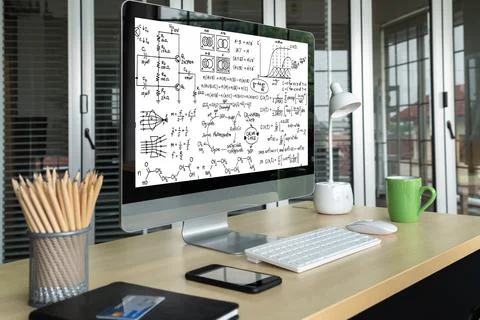 Mathematic equations and modish formula on computer screen 写真素材