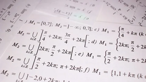 Mathematical examples closeup texture video on rolling rotating looping plate Stock Footage 104332969