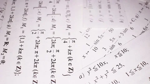 Mathematical examples closeup texture video on rolling rotating looping plate Stock Footage 104333186