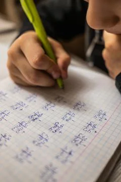 Mathematical examples that the student writes and solves. Sum and subtraction 스톡 사진