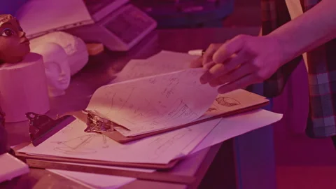 Mathematician looking at calculations. Media. Mathematical notes on notebook in Stock Footage 278210695