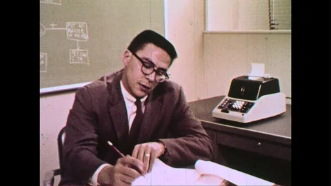 A mathematician outlines a method for solving problems. Stock Footage 74451659