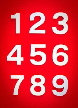 Mathematics background made with solid numbers. Isolated on red Mathematic... 写真素材