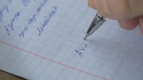 Mathematics, Equations close-up. Homework. Solving Mathematical Problem. Student Stock Photos