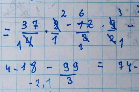 Mathematics homework showcases problem-solving skills in a study space Stock Photos