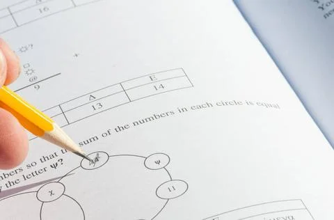 Mathematics problem solving with exam paper questions. Mathematics problem... Stock Photos