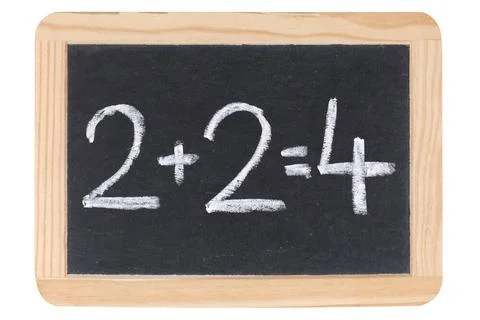 Mathematik auf einer Tafel Die Rechnung 2 + 2 = 4 steht auf einer Tafel Co... Stock Photos
