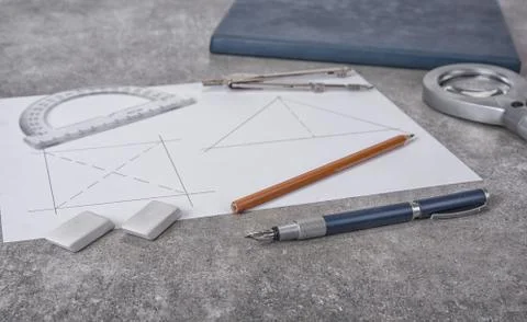 Mathemethics and geometry tools in the school and projecting. Stock Photos