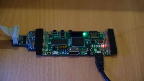 Matherboar outside PC connected with cables with red light Stock Footage 113085209