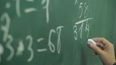 Maths' chalkboard. Hand's writing simple mathematical equation Video stock 117328211
