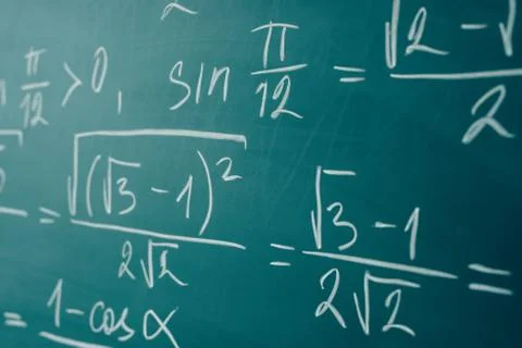 Maths formulas written by white chalk on the chalkboard Stock-Fotos
