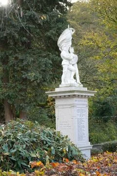 Matlock Bath, England: War Memorial Soldiers Statue, Flag, Autumn Trees, Stock Photos