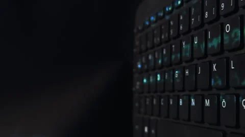 Matrix Hacker Style Green Data Stream on Computer Keyboard Stock Footage 327175056