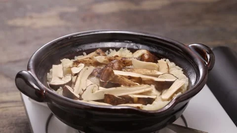 Matsutake Gohan( boiled rice with matsutake mushrooms ), Japanese autumn food Stock Footage