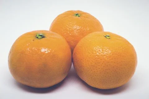 Matte Closeup of Three Clementines Stock Photos