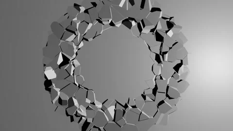 The matte gray surface begins to crumble in the middle, revealing a black Stock Footage 152792604