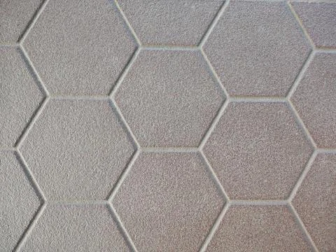 Matte hexagonal tiles with a stone texture. 스톡 사진