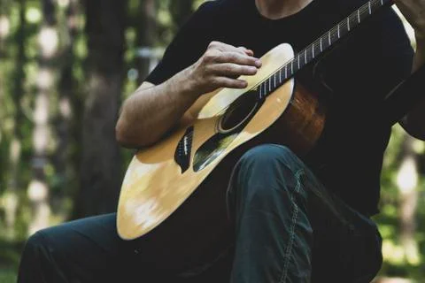 Matte image. The man plays the guitar. Stock Photos