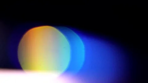 Matte light and large seven-color bokeh in the dark Vídeo Stock 309426689